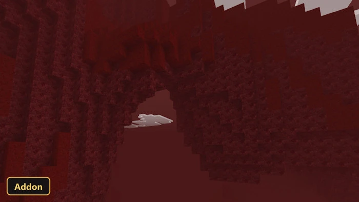 red cave entrance with white cloud-like structures in the distance