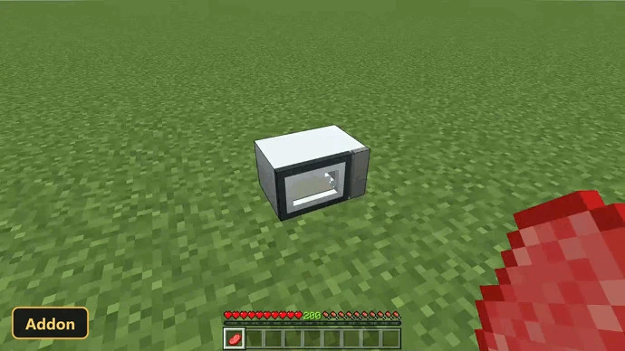 microwave oven on a grassy plain at daytime