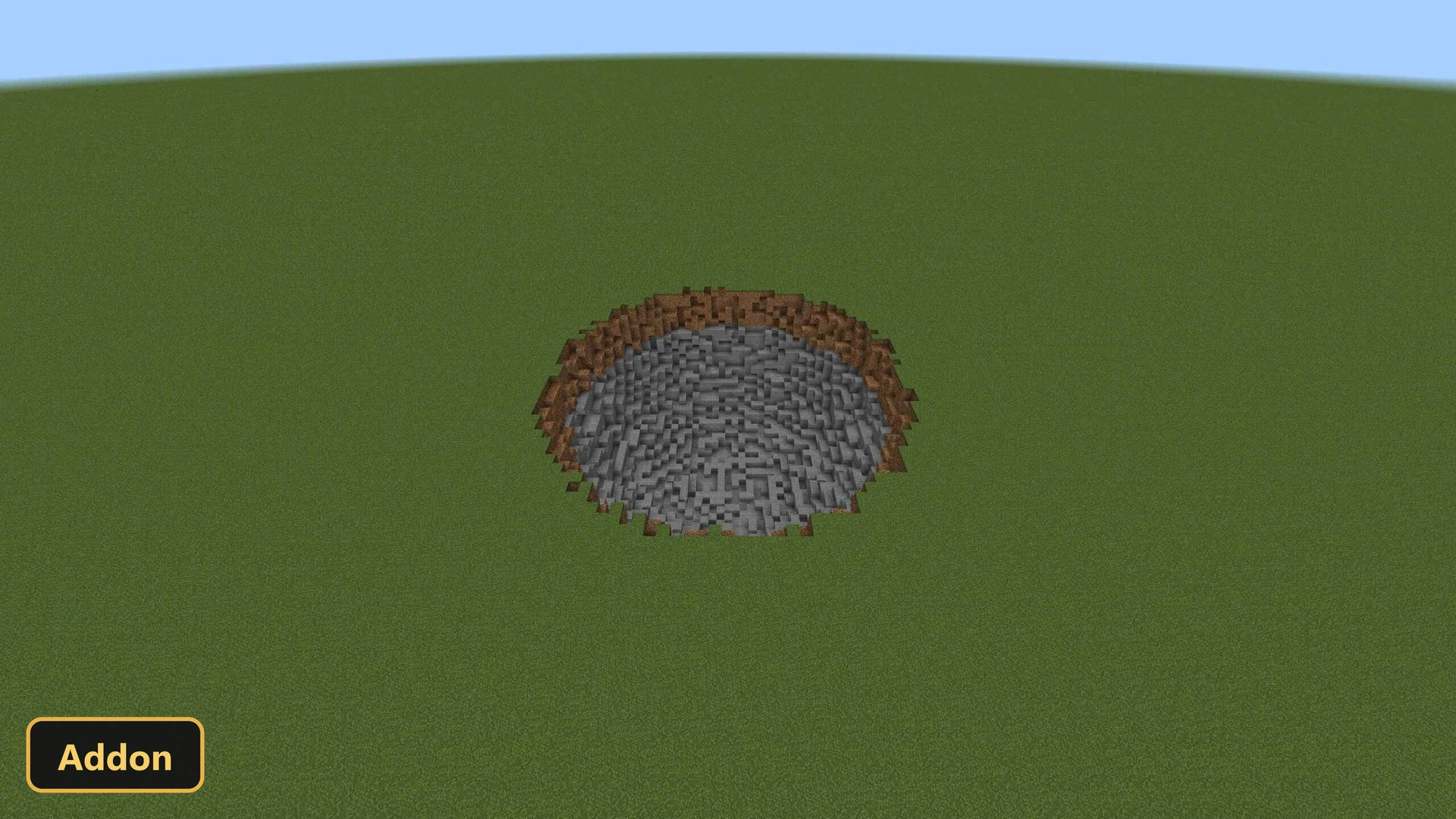 a small, deep, circular crater in a grassy field, daytime