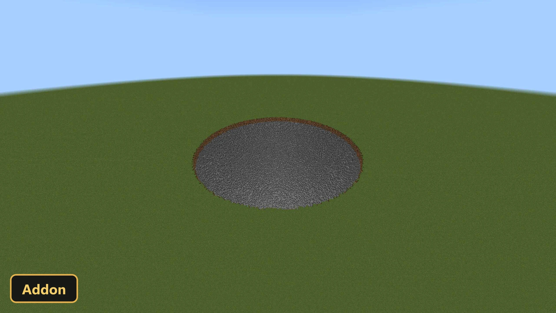 a large, shallow, circular crater in a grassy field, daytime