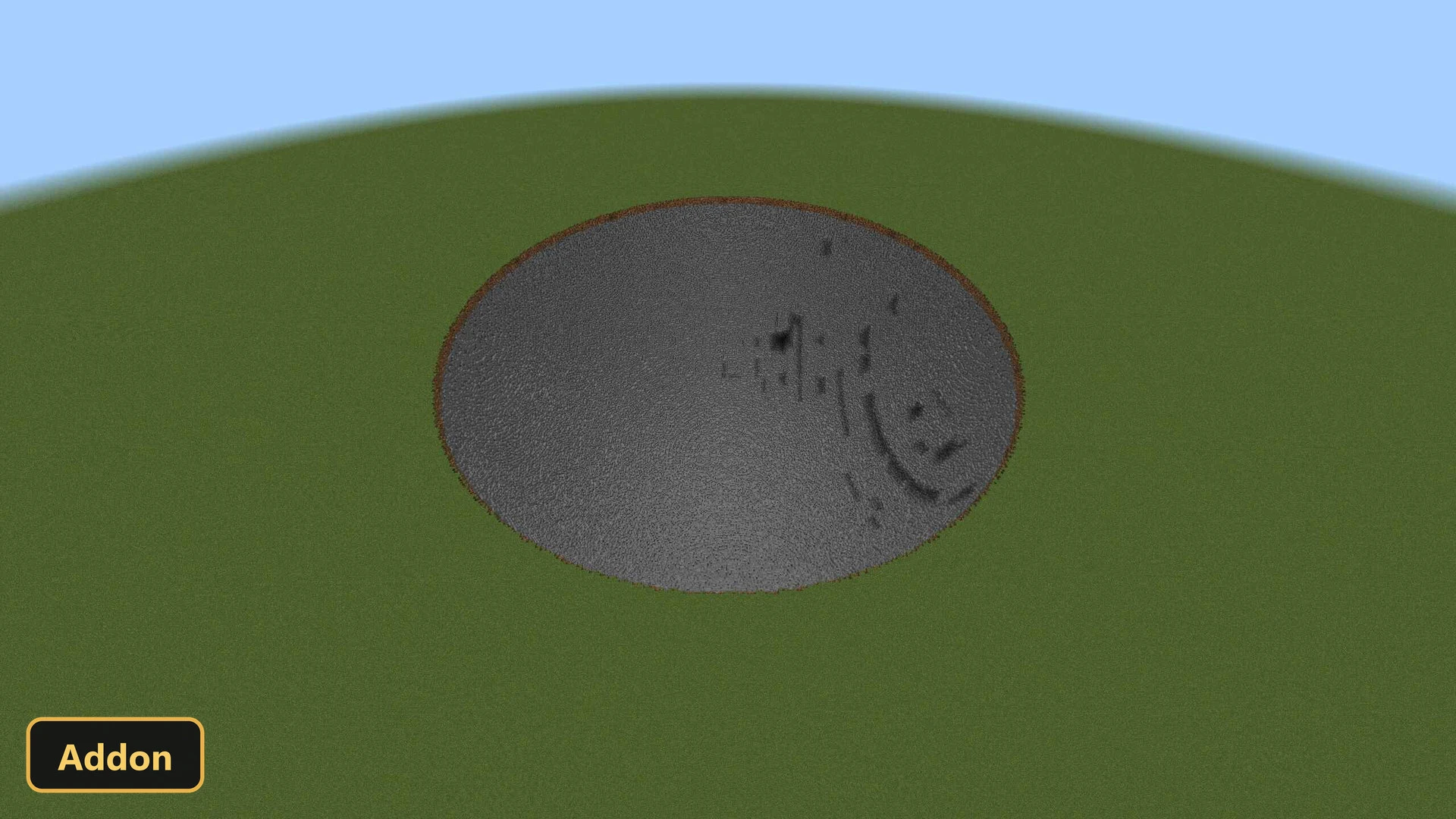 an even larger, very shallow, circular crater in a grassy field