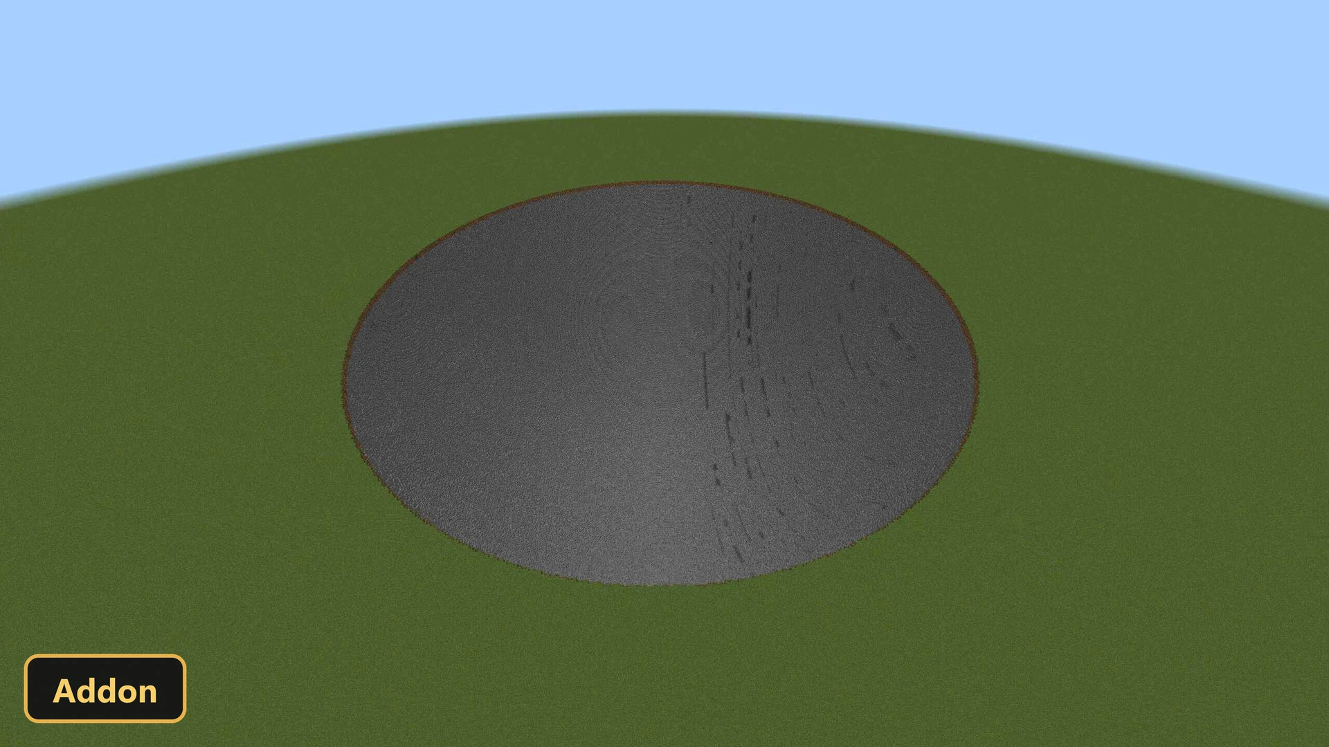an enormous, almost flat, circular crater in a grassy field