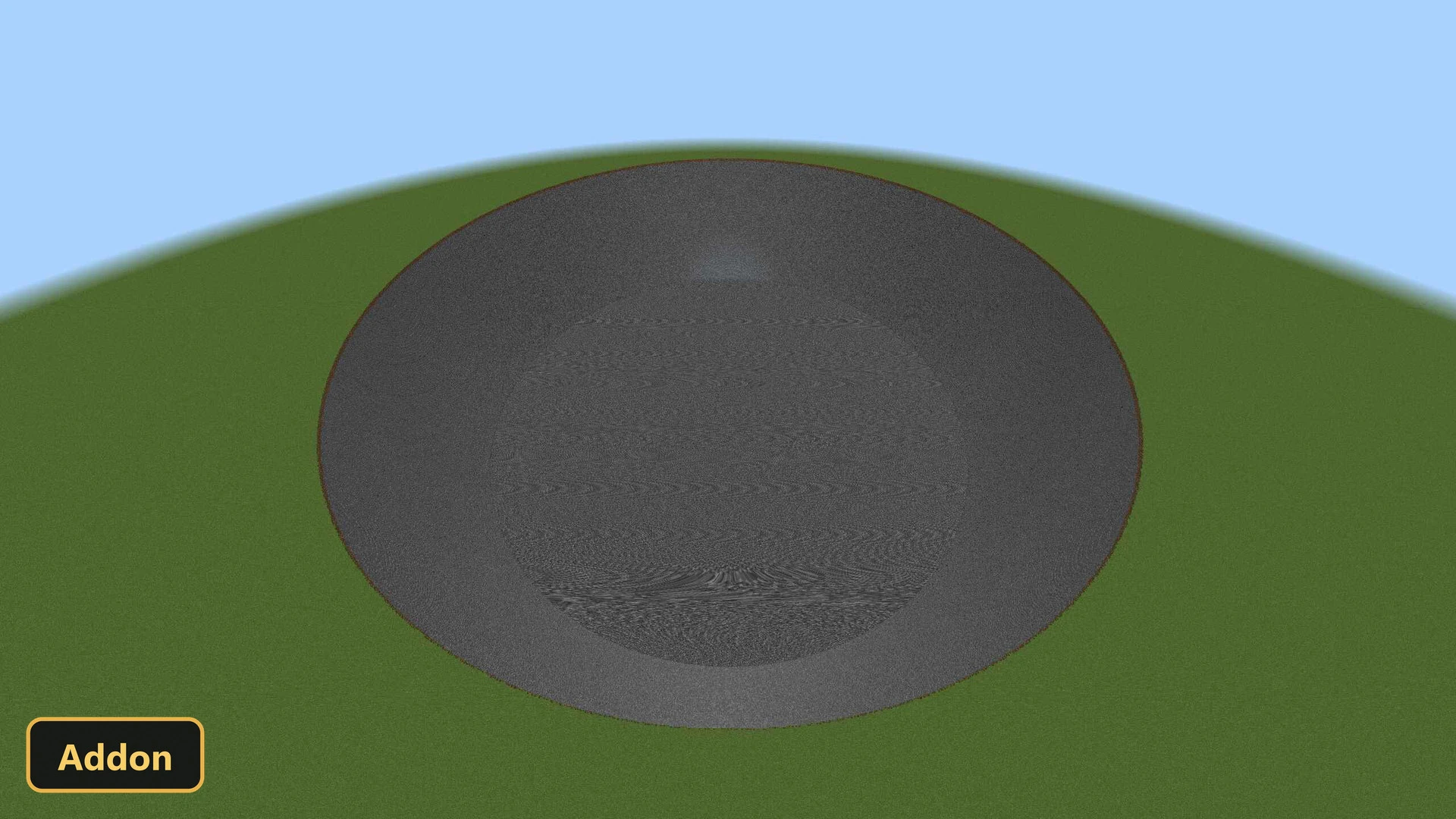 a massive, perfectly flat, circular crater in a grassy field