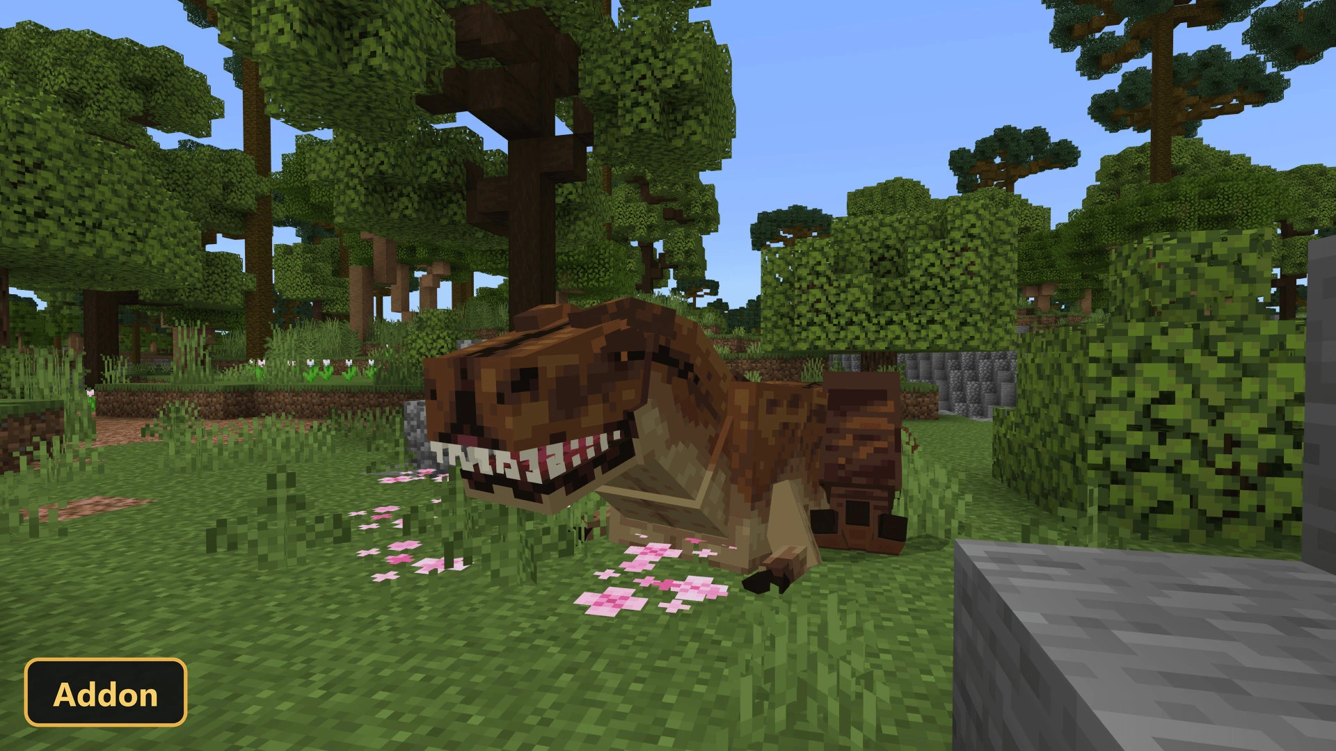 brown dinosaur resting on grass with pink flowers in a forest