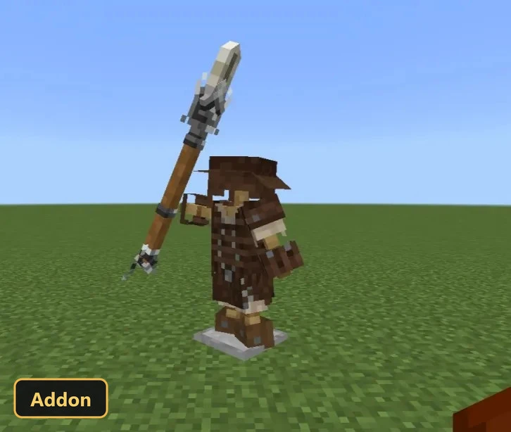 armor stand with brown leather armor holding a bone-tipped spear