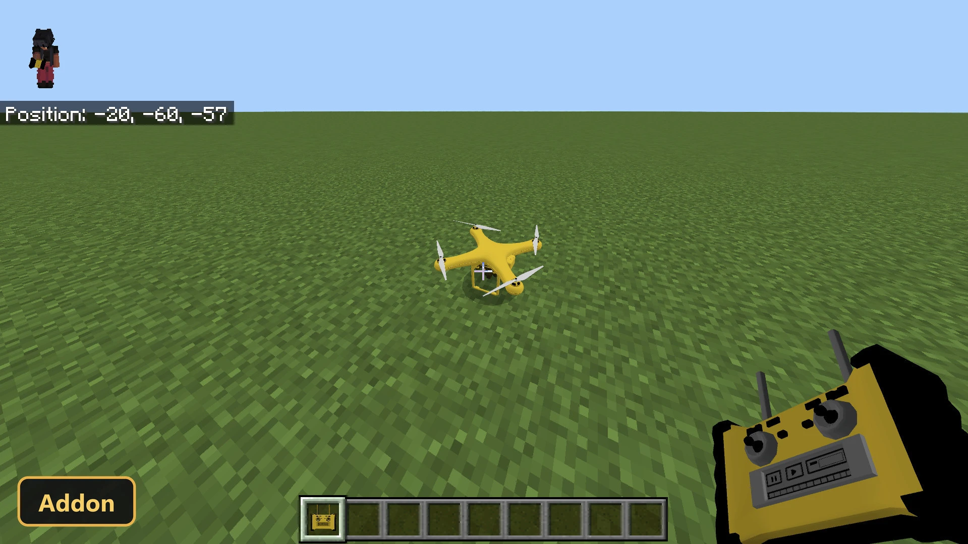 yellow drone on a grass plain, player holding a remote, daytime
