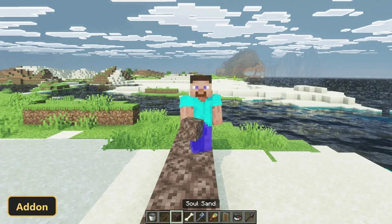 player holding soul sand on a beach with water and islands