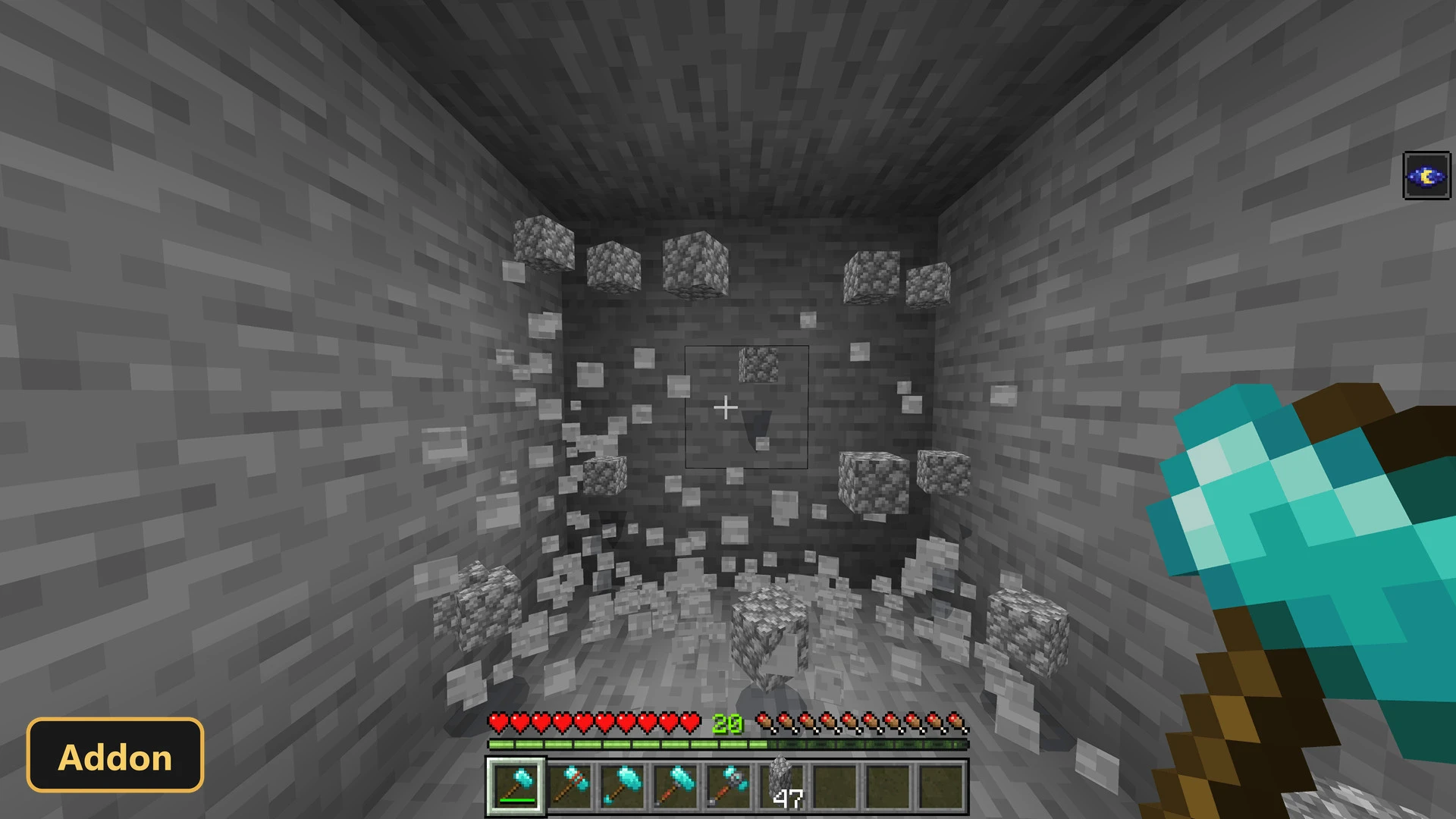 player mining a large area of stone blocks with a hammer