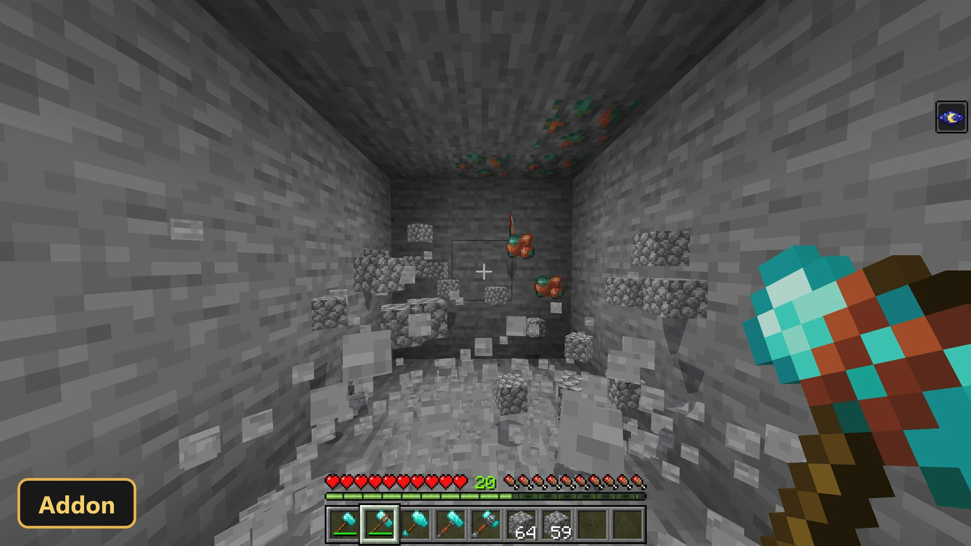 player mining a large area of stone and copper ore with a hammer
