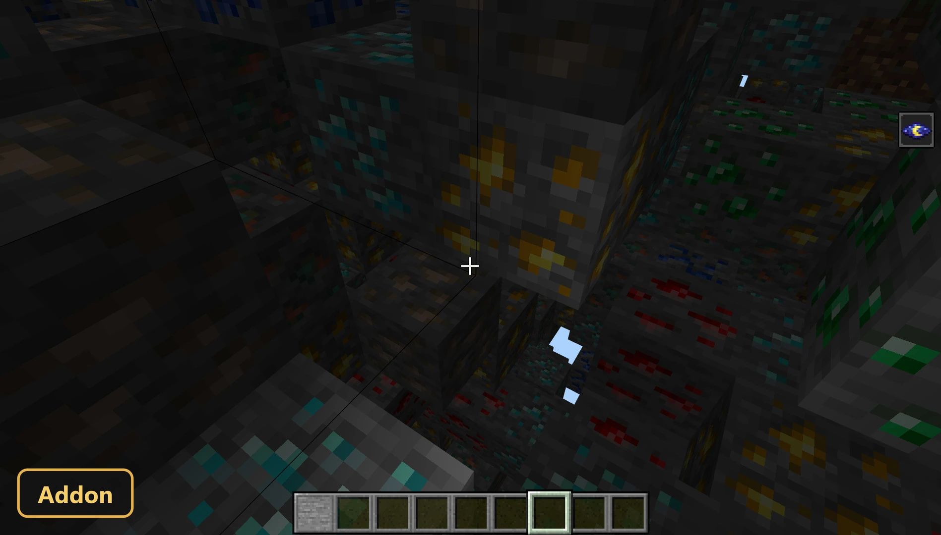underground cave with various ore blocks, including gold, diamond, emerald