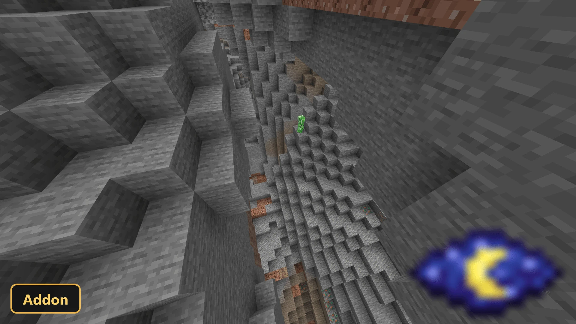 deep stone ravine with a creeper and exposed ore veins