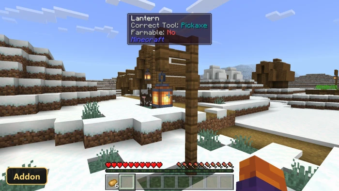 a lantern on a post in a snowy village biome