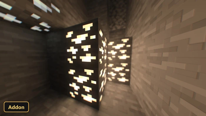 glowing gold ore blocks lighting up a narrow stone tunnel