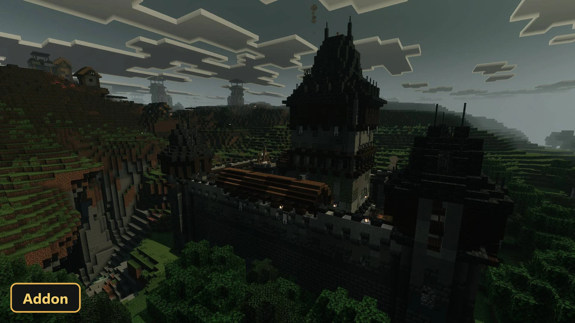 expansive view of a medieval castle and surrounding hilly landscape