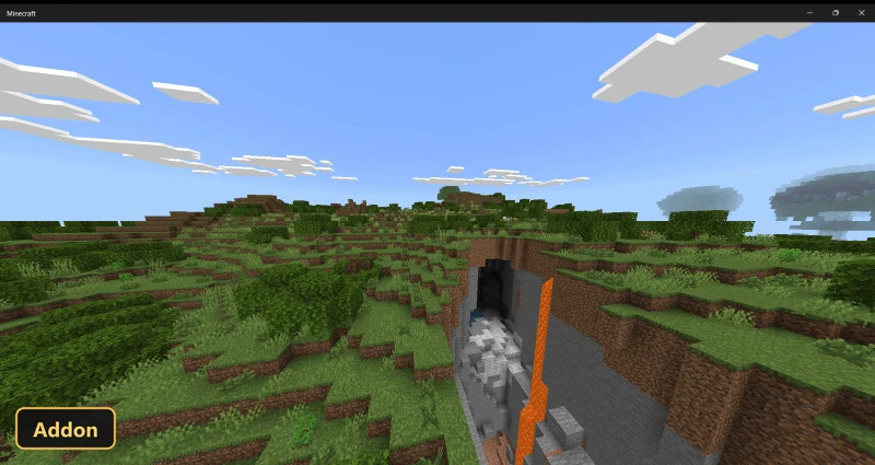rolling green hills with a large cave entrance showing lava flow