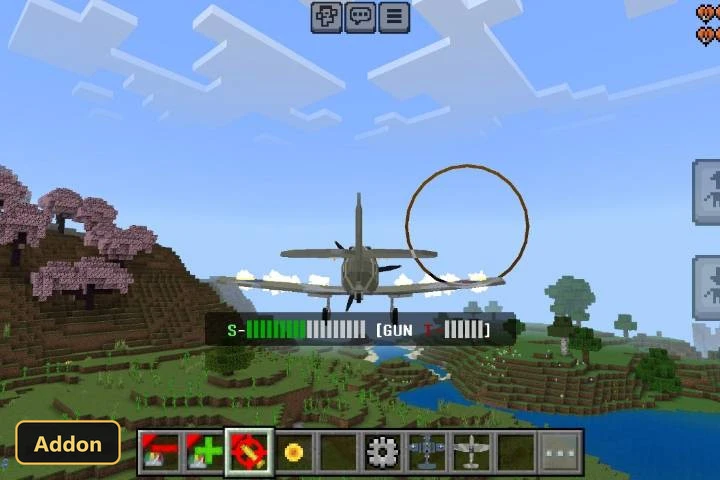 flying a plane over a grassy landscape with a river and cherry trees