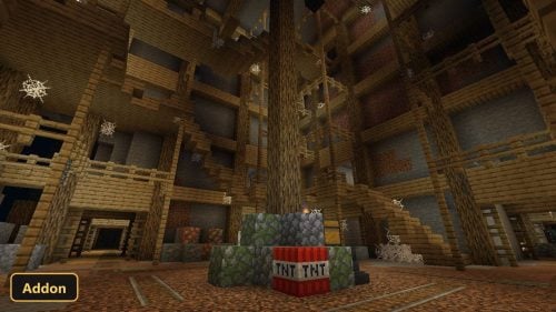 large wooden mineshaft structure with TNT and spiderwebs
