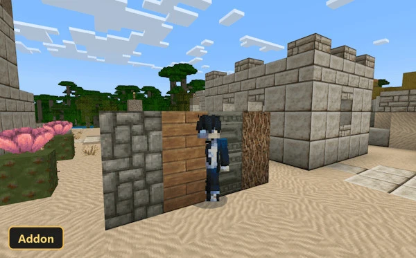 player character standing behind three blocks in a desert