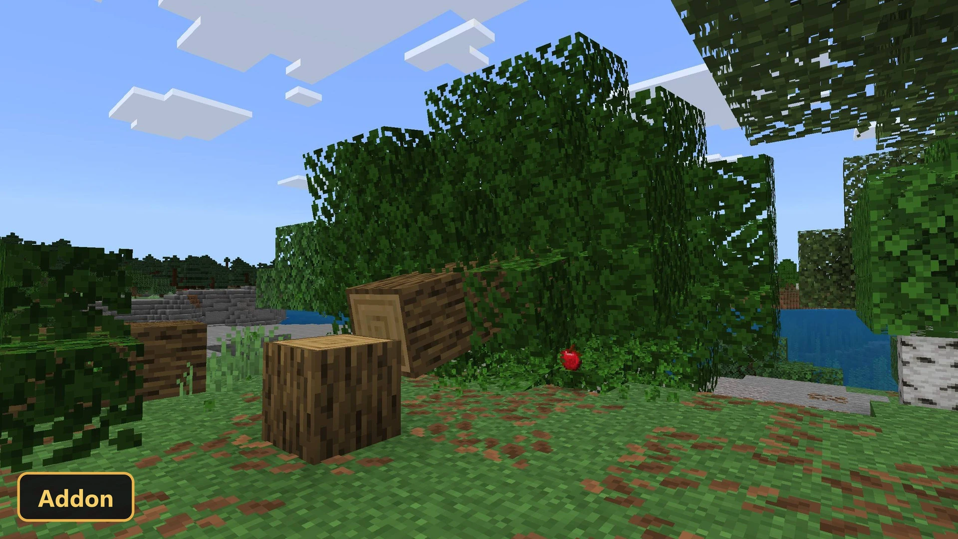 a felled tree with an apple falling from its leaves