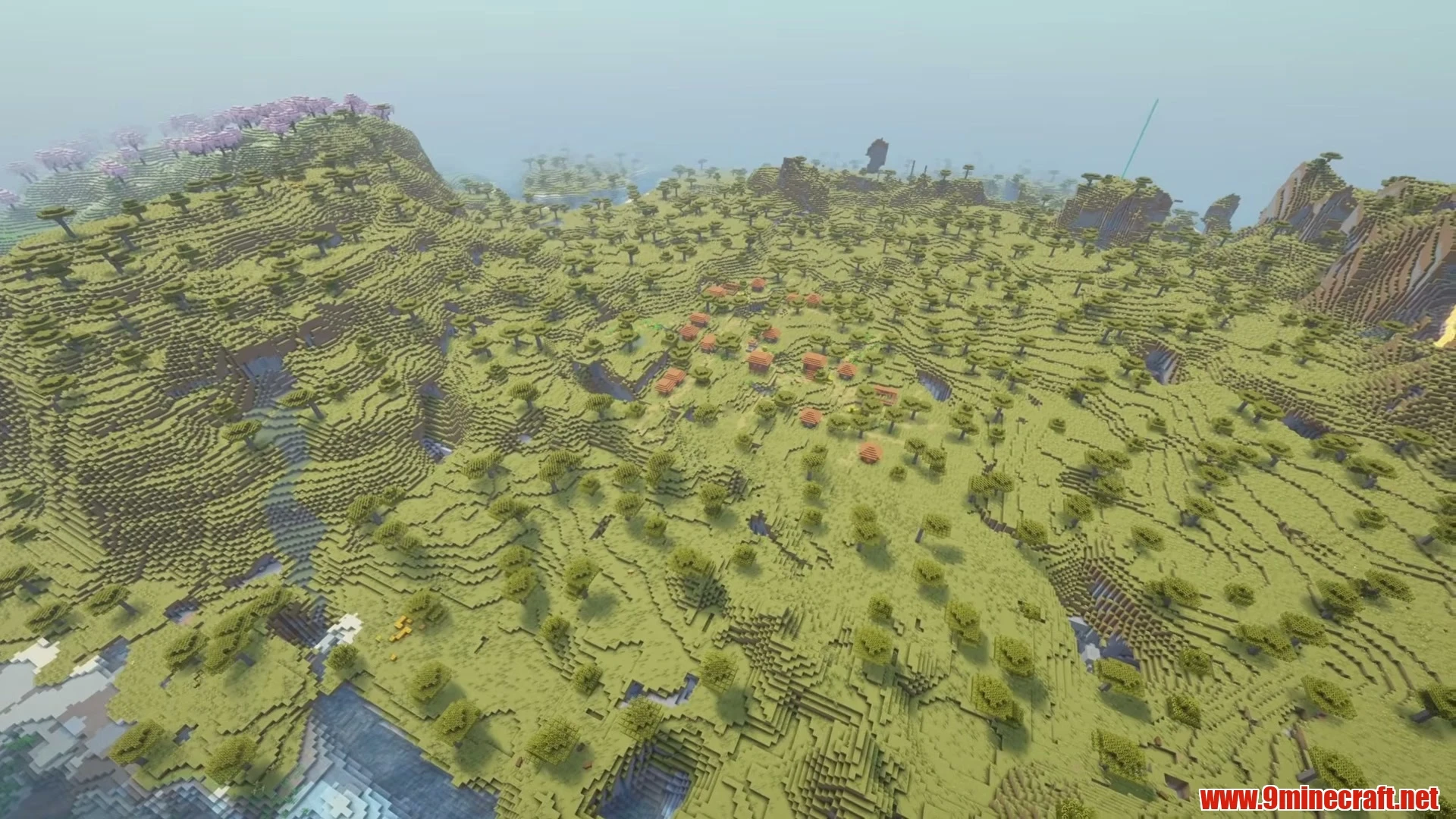Lakeside Basin Village & Exposed Cave Mouth - Minecraft 26.3 Seed -1134873580560433779 View 1